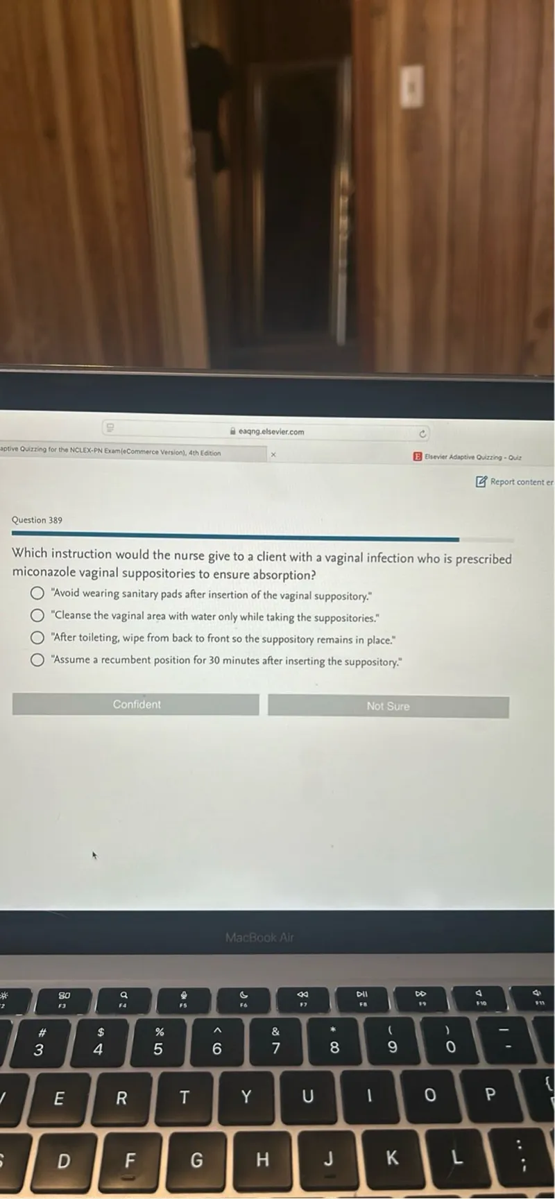 Which instruction would the nurse give to a client with a vaginal infection who is prescribed miconazole vaginal suppositories to ensure absorption?  
"Avoid wearing sanitary pads after insertion of the vaginal suppository."  
"Cleanse the vaginal area with water only while taking the suppositories."  
"After toileting, wipe from back to front so the suppository remains in place."  
"Assume a recumbent position for 30 minutes after inserting the suppository."