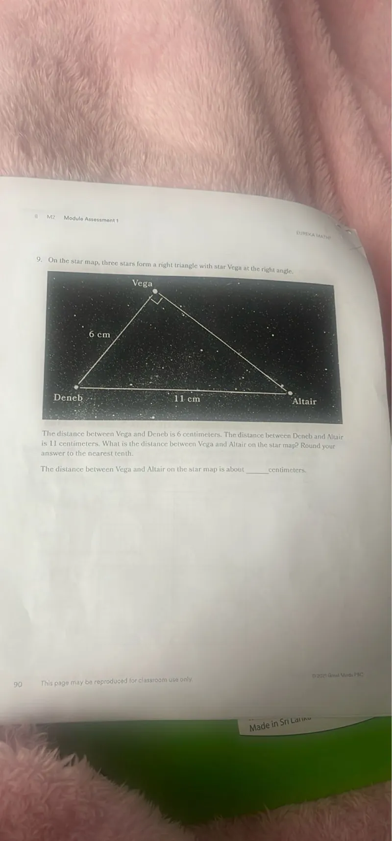 On the star map, three stars form a right triangle with star Vega at the right angle.

The distance between Vega and Deneb is 6 centimeters. The distance between Deneb and Altair is 11 centimeters. What is the distance between Vega and Altair on the star map? Round your answer to the nearest tenth.

The distance between Vega and Altair on the star map is about  centimeters.