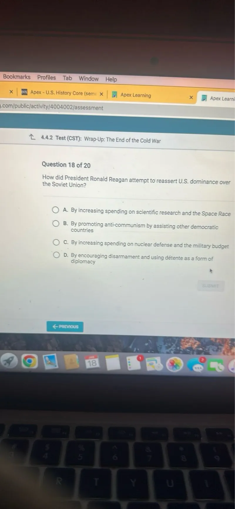 How did President Ronald Reagan attempt to reassert U.S. dominance over the Soviet Union?
A. By increasing spending on scientific research and the Space Race
B. By promoting anti-communism by assisting other democratic countries
C. By increasing spending on nuclear defense and the military budget
D. By encouraging disarmament and using détente as a form of diplomacy