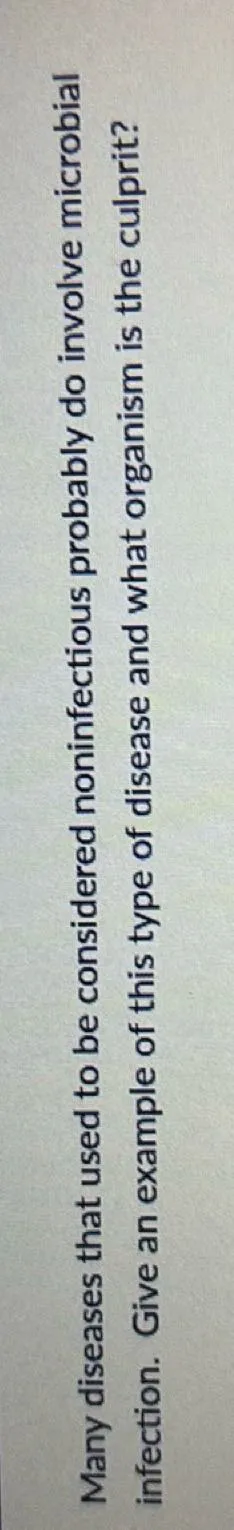 Many diseases that used to be considered noninfectious probably do involve microbial infection. Give an example of this type of disease and what organism is the culprit?